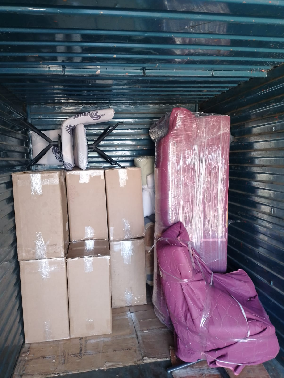 Loading household items into moving truck in Kukatpally